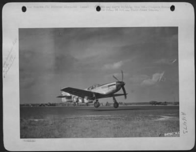 Thumbnail for North American > A North American P-51 Mustang, fighter plane of the 9th AF, converted into a Photographic Plane, takes off from a base somewhere in France.