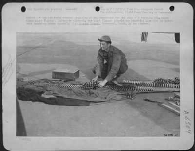 Thumbnail for General > FRANCE-A 9th Air force armorer preparing 20 mm. ammunition for the guns of a Northrup P-61 Black Widow night fighter. Defensive aircraft, the night fighter patrols the Siegfried Line area to intercept intruding enemy aircraft. Sgt. Chester Damrow