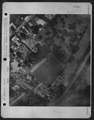 Consolidated > Clearly Shown Here Are Enemy Fortifications Near St. Lo, France, On D-Day.  This Picture Was Made In The Early Morning Hours By Use Of An Electric Flash Bulb Developed By Engineers Of Air Technical Service Command, Wright Field, Ohio, And The General Elec