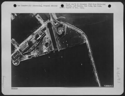 Consolidated > Boom Depot At Cherbourg, France.   Annotations Are: 1. Two Anti-Torpedo Nets Laid Out On The Ground.  These Nets Are Steel Mesh, And Some 50 Feet In Depth, And Supported By Floats At Intervals Of Six Feet, And By Buoys At Intervals Of 200 To 400 Feet.  2.