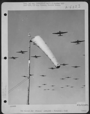 Thumbnail for Curtiss > Formation Of Curtiss C-46 Commandos Passes Over A 9Th Troop Carrier Command Base Somewhere In France.  21 March 1945.  [9Th Air Force 313 Tcg]