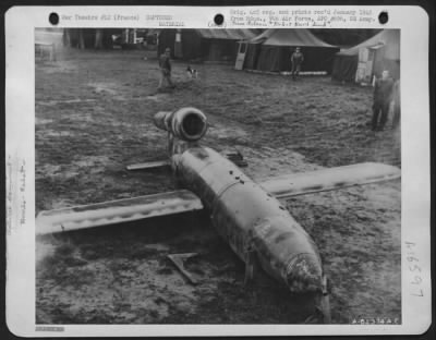 General > Part Of A Complete German 'Robot Bomb' Found Intact By Members Of The 9Th Air Force In France.  It Had Come In For A 'Perfect' Landing And Did Not Explode.  A Bomb Disposal Unit Dis-Assembled The Unit And Loaded It Aboard A Transport Plane To Be Flown To