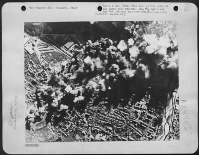 Thumbnail for Consolidated > Afbq Nov. 14Th -- Blasting Railway Centre Near Brenner Pass -- Large Columns Of Smoke Rising From The Railway Yards At Bolzano, Italy, Near The Brenner Pass, After A Raid By Boeing B-17 Flying Fortresses Of The 15Th Army Air Force On November 10Th.  Hits