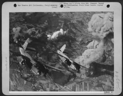 Consolidated > Martin B-26 Marauder of the 1st Tactical Air Force break sharply away from their target, while another flight of the speedy, twin-engined bombers nimbly dodges a column of smoke 8,000-feet high, rising from a Nazi fuel dump at Collecchio, in the Po