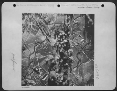 Thumbnail for Consolidated > Wherever there was a railroad yard on Italian lines leading into the Rome area, there bombers of the Mediterranean Allied Air Forces found targets. The Aiming point here is the railroad yard at Fabriano, an important junction on the line from the