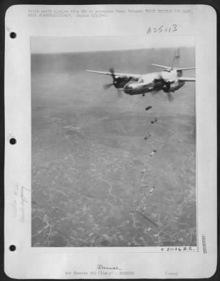 Thumbnail for Consolidated > You can count eight bombs, evenly spaced, in this photo from the Mediterranean Allied Air Forces, showing destruction en route from the bomb bay of a Martin B-26 Marauder of the 1st Tactical Air Forces to the west railroad yards below at Florence