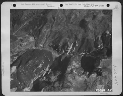 Consolidated > MARAUDERS GIVE AXIS BRIDGE THE "ONE-TWO-THREE." This sequel of photos show one day's work in the long-range program of medium bombardment to knock out Axis communications in Italy. AAF Martin B-26 Marauders on the way to