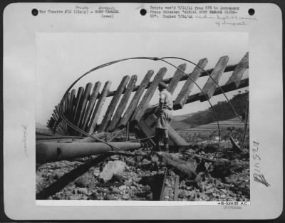 Thumbnail for Consolidated > Twisted rail ties and tracks punctuate the railroad at Orvieto in central Italy after attacking planes from the Mediterranean Allied Air Forces blasted and smashed this important rail link, over which the Nazi was sending supplies to his forces on