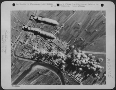 Consolidated > Boeing B-17 Flying Fortresses of the15th AAF smashed Pontedera railroad yards in a successful attack on 22 Jan 44. Photo interpretation shows a heavy concentration of bombs falling throughout the target area, thus crippling another vital Axis rail