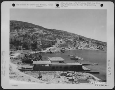 Thumbnail for Consolidated > Bomb damage to harbor at Porto San Stefano, Italy. 12 May 1944