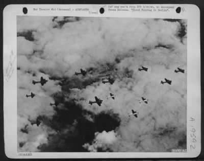 Boeing > CLOUD HOPPING TO BERLIN: With breaks in the cloud banks below them affording only momentary glimpses of the earth, these Fortresses of the U.S. Army Air Forces wing their way to Berlin to take part in a history-making attack. The American heavy