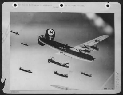 Consolidated > ACHTUNG . . . ACHTUNG . . . SOUNDS AS THESE CONSOLIDATED B-24 LIBERATORS of the Eighth AF fly a tight formation on their way to bomb another vital target deep in the heart of Nazi Germany. Their target on this occasion was Gotha, Germany