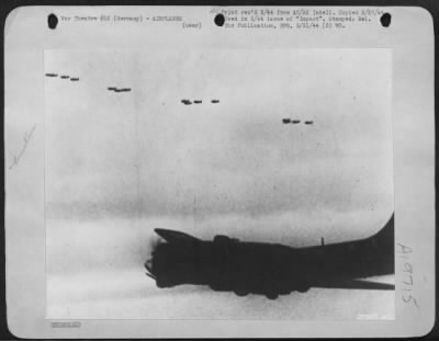 Republic > At rendezvous, one squadron of Republic P-47 Thunderbolts go high. Others maneuver with Boeing B-17 Flying Fortresses on way to bomb target at Emden, Germany.