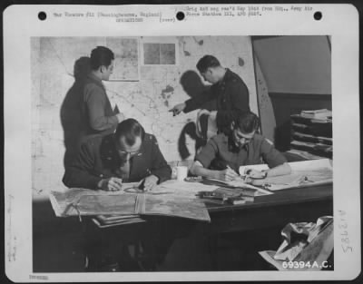 General > S-2 Intelligence Officers Of The 91St Bomb Group, Based At Bassingbourne, England, At Work Planning Another Mission For Bombers Over Berlin.  25 February 1944.