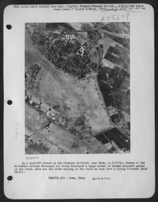 Consolidated > In a surprise attack on the Ciampino airfield, near Rome, on 9/17/43, planes of the Northwest African Strategic Air Force destroyed a large number of German Aircraft parked on the field. Here are the bombs falling on the field as seen from a Flying