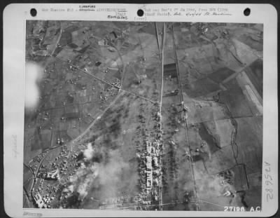 Consolidated > AT AN ADVANCED 12TH ARMY AIR FORCE BOMBER BASE, Jan 14 . . . . USAAF B-26 Marauders of the 12th AAF mauled the Ciapion Airfields at Rome yesterday. Photograph taken during the attack shows bombs exploding among hangars and
