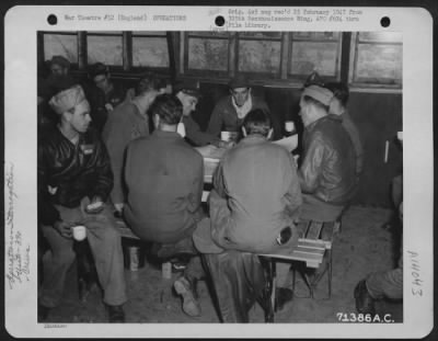 Thumbnail for General > Crew Of The 390Th Bomb Group Who Have Just Returned From Raids Over Stuttgart And Strasbourg, Germany, Are Interrogated At Their 8Th Air Force Base In England.  6 September 1943.