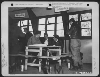 Thumbnail for General > Crew Of The 390Th Bomb Group Who Have Just Returned From Raids Over Stuttgart And Strasbourg, Germany, Are Interrogated At Their 8Th Air Force Base In England.  6 September 1943.