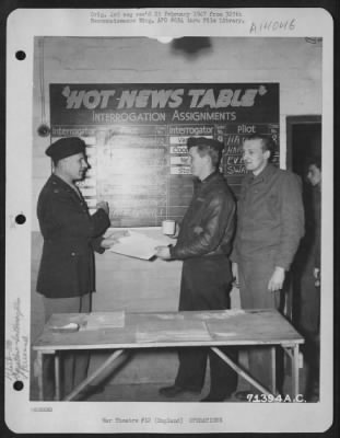 Thumbnail for General > Crew Number 43 Of The 390Th Bomb Group, Reports To Capt. Hardell, Intelligence Officer, At The Interrogation Table After A Mission Over Enemy Territory.  England, 10 March 1944.