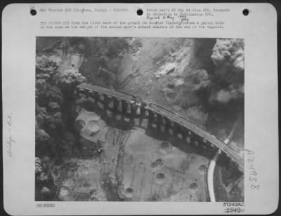 Consolidated > The Direct Hit From The First Wave Of The Attack On Bucine Viaduct, Italy, Leaves A Gaping Hole In The Span As The Weight Of The Second Wave'S Attack Smashes At The End Of The Viaduct.