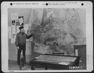 General > An Officer Of The 410Th Bomb Group Points To A Wall Map Showing The Target Of The Day During Briefing At A 9Th Air Force Base, England, 25 July 1944.