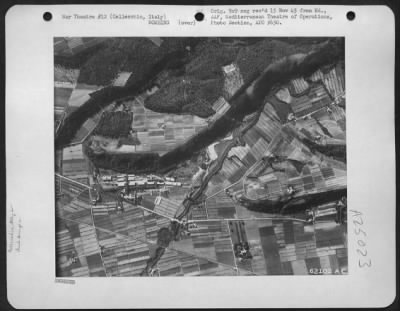 Consolidated > Before - Fuel And Storage Dumps Near Cellecchio, Italy, Seven Miles Southwest Of Parma, Italy, As Seen By The Approaching Martin B-26 Marauders Of The 12Th Af Before Relasing Their Bombs For Another Concentrated Attack Against The Enemy.  7 July 1944.