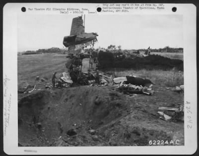 Thumbnail for Consolidated > Bomb Damage To Airplane At Ciampino Airdrome Near Rome, Italy.  Note Bomb Crater.