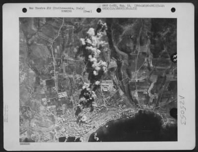 Thumbnail for Consolidated > As Bombs Burst On Civitavecchia, Italy, More Bombs Head For The Target Area To Add To The Destruction Brought About By Planes Of The 2Nd Bomb Group, 20Th Bomb Squadron On 12 May 1944.