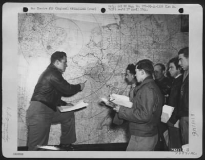 Thumbnail for General > Lt. Carl C. Machemer, Left, Forest Hills, Ny, Gives Combat Crews Information About A Target In Europe In The New Combat Crew Library At A "Flying Fortress" Station At Framlingham, England.  The Library Was Designed To Serve As A Source Of Information For