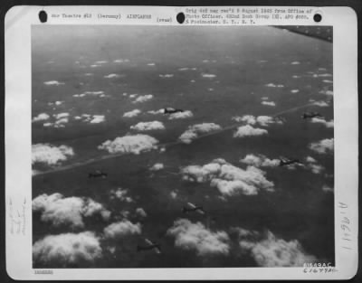 Boeing > Cloud Hopping To Frankfurt - With Breaks In The Clouds Affording Momentary Glimpses Of The Earth, These B-17 Flying Fortresses Of The 452Nd Bomb Group Wing Their Way Toward Frankfurt, Germany, To Take Part In A History-Making Attack.  Taken 20 March 1944