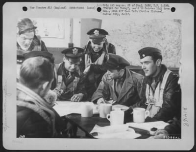 General > An Intelligence Officer At An Airbase Somewhere In England Quizzes A Bomber Crew After Their Return From A Mission Over Enemy Territory.  This Information Is Of Great Importance For Further Missions Regarding Airfields, German Methods Of Attack, Firepower