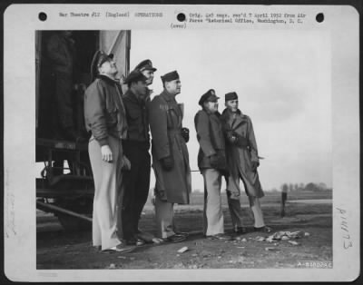 Thumbnail for General > Waiting For The Liberators -- At An 8Th Air Force Base Somewhere In England, Officers Of The 458Th Bomb Group Peer Into The Skies To Count Returning Planes After A Recent Bombing Mission Over Enemy Targets Somewhere In Europe.  26 February 1945.