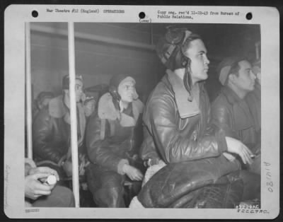 General > At An 8Th Air Force Base In England, Boeing B-17 "Flying Fortress" Crew Members Listen Attentively At A Briefing Prior To A Bombing Mission Against Enemy Targets Somewhere In Germany.