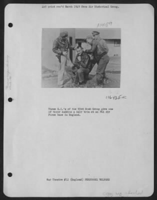 General > Three G.I.'S Of The 93Rd Bomb Group Give One Of Their Buddies A Hair Trim At An 8Th Air Force Base In England.