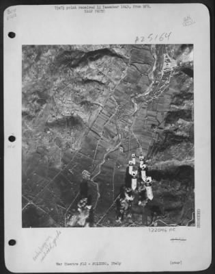 Consolidated > Marauders Blast Foligno Marshalling Yards - This Bomb Strike Photo Shows Bombs From A B-26 Marauder Enroute To Another Axis Target In Italy, The Marshalling Yards At Foligno, Northeast Of Rome.  Other Bombs Are Seen Hitting Amoung The Tracks And Yards At