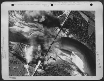 Consolidated > This Picture Was Taken Immediately After The Precision Bombing By The North American B-25 Mitchells And Shows The Center Of The Huge Structure Destroyed In Two Places, Thus Depriving The Germans Of Another Vital Communications Link.  Galliate, Italy.