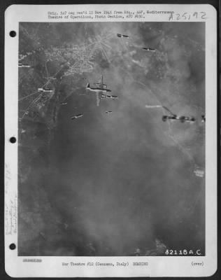 Consolidated > This Picture, Snapped On A Mission By Martin B-26 Marauders Against A German Troop Concentration West Of Velletri, Shows A Narrow Escape By One Of The Medium Bombers From The Explosives Of Its Own Formation.  The Near Accident Resulted When The Plane'S Pi