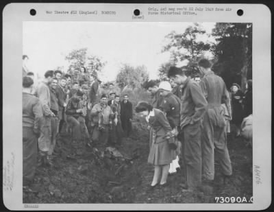 Gosfield- V-2 > Interested Members Of The 410Th Bomb Group And English Civilians Look Over The Remanents Of A German Robot Bomb Which Exploded Near A 9Th Air Force Base In England.  9 July 1944.