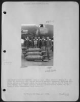 "Rum Buggy" Combat Crew Members'.  Left To Right:  S/Sgt. Robert E. Dahlem, Jr., Tail Gunner, St. Petersburg, Fla., 2Nd Lt. William R. Anderson, Bombardier, Ho-Ho-Kus, N.J., 1St Lt. Alfred L. Freiburger, Pilot, St. Petersburg, Fla., 2Nd Lt. Alan R. Hogan, - Page 1