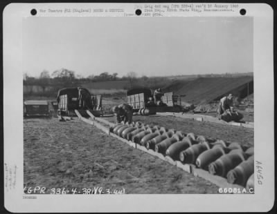 General > Rolling Bombs Into The Camouflaged Bomb Dump Of The 381St Bomb Group At 8Th Air Force Station 167 In England, 9 March 1944.