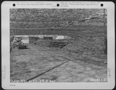 General > Truck And Trailer Used To Haul Bombs From Thsi Camouflaged Bomb Dump To The Planes Of The 381St Bomb Group In England, 9 March 1944.