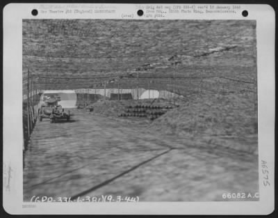 General > Truck And Trailer Used To Haul Bombs From Thsi Camouflaged Bomb Dump To The Planes Of The 381St Bomb Group In England, 9 March 1944.