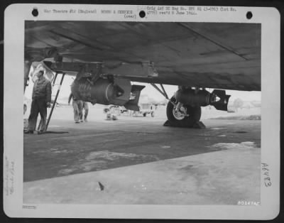 General > To Increase The Load, Two External Bomb Racks, Carrying 1000-Lb Bombs Are Added To This Boeing B-17 Of The 303Rd Bomb Group At Molesworth, England.  18 September 1943.