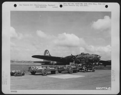 General > A Loaded Bomb Trailer Is Parked Beside The Boeing B-17 "Flying Fortress" "Chennault'S Pappy" At The 91St Bomb Group Base In Basinbourne, England.  9 April 1944.