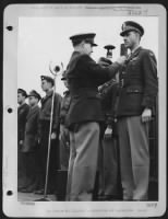 Maj Gen Curtis E. Lemay, Lakewood, Ohio, Division Commander, Is Pinning The Distinguished Unit Medal On The Tunic Of Lt. Colonel Louis G. Thorup, Of 115 Edith Ave., Salt Lake City, Utah, Who Led This Group On The Mission To Brunswick On Jan 11, 1944 For W - Page 1