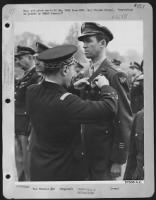 French Honor Colonel Stewart.  Colonel James M. Stewart, Of Indiana, Pa., Former Screen Star, Now Stationed In England, Receives The Croix De Guerre With Palm From Lt. Gen. Martial Valin, Chief Of Staff For The French A.F. During A Colorful Ceremony Honor - Page 1
