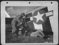 Thumbnail for FRANCE-Cpl Carl D. Knox (left) of Syracuse, N.Y., and Cpl Alfred Van Drake, of Newark, N.Y., install an aerial camera on a Photo Reconnaissance plane at a Ninth Air Force base somewhere in Europe. - Page 1