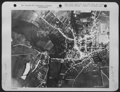 Thumbnail for Night > Night photo of Breteuil, France, taken at 10,000 feet by Lt.Colonel Leon Gray's U.S. Eighth Air Force Reconnaissance Group. Photo was taken in the dead of night by the use these flash bombs that individual tree shadows along the road may be counted.