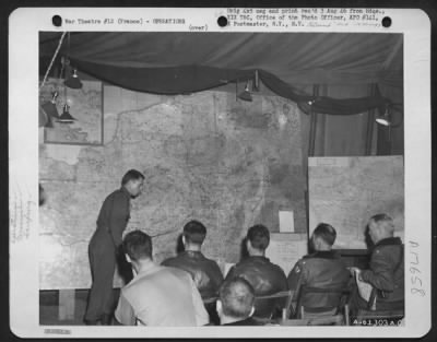 General > The Late Major Swanson, G-2 Air Officer Who Was Killed In Action During Xix Tac'S Stay In Nancy, France, Is Shown At A Briefing In September At The Foret De Marchenior Cp.