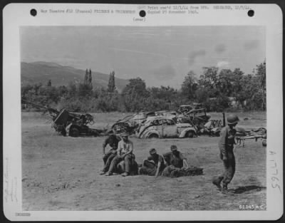 General > Captured Huns Wait To Be Taken To The Rear And Rest Beside Their Shot Up Motor Vehicles And Guns, Targets For Fighter-Bombers That Strafed Them In A Four-Day Attack On The Retreating Hun In The Rhone Valley.  Over 2,000 Vehicles 1,500 Horses, 20 Railroad